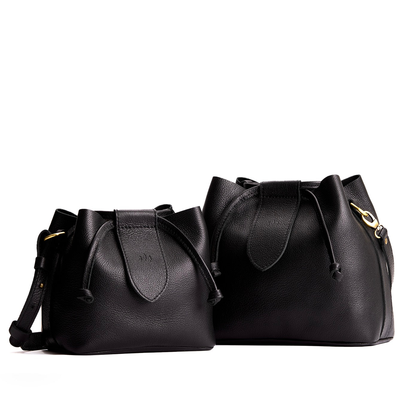 Pebbled--black | Small and large symmetrical leather bags with leather drawstring closure and adjustable shoulder strap