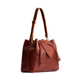 Nutmeg Large | Symmetrical leather bag with leather drawstring closure and adjustable shoulder strap
