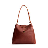 Nutmeg Large | Symmetrical leather bag with leather drawstring closure and back ring for accessories