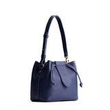 Cobalt Small | Symmetrical leather bag with leather drawstring closure and adjustable shoulder strap