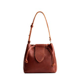 Nutmeg Small | Symmetrical leather bag with leather drawstring closure and adjustable shoulder strap