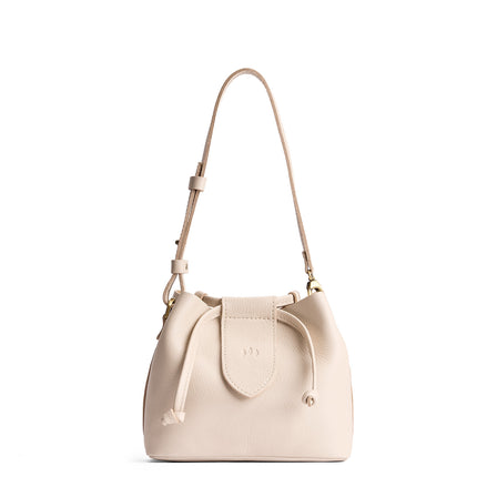 Pebbled Bone*Small | Symmetrical leather bag with leather drawstring closure and adjustable shoulder strap