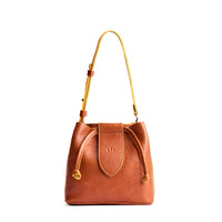 Sienna*Small | Symmetrical leather bag with leather drawstring closure and adjustable shoulder strap