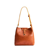 Sienna Small | Symmetrical leather bag with leather drawstring closure and back ring for accessories