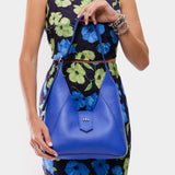 Astro Blue | Model holding structured hobo shoulder bag with adjustable strap and magnetic closure