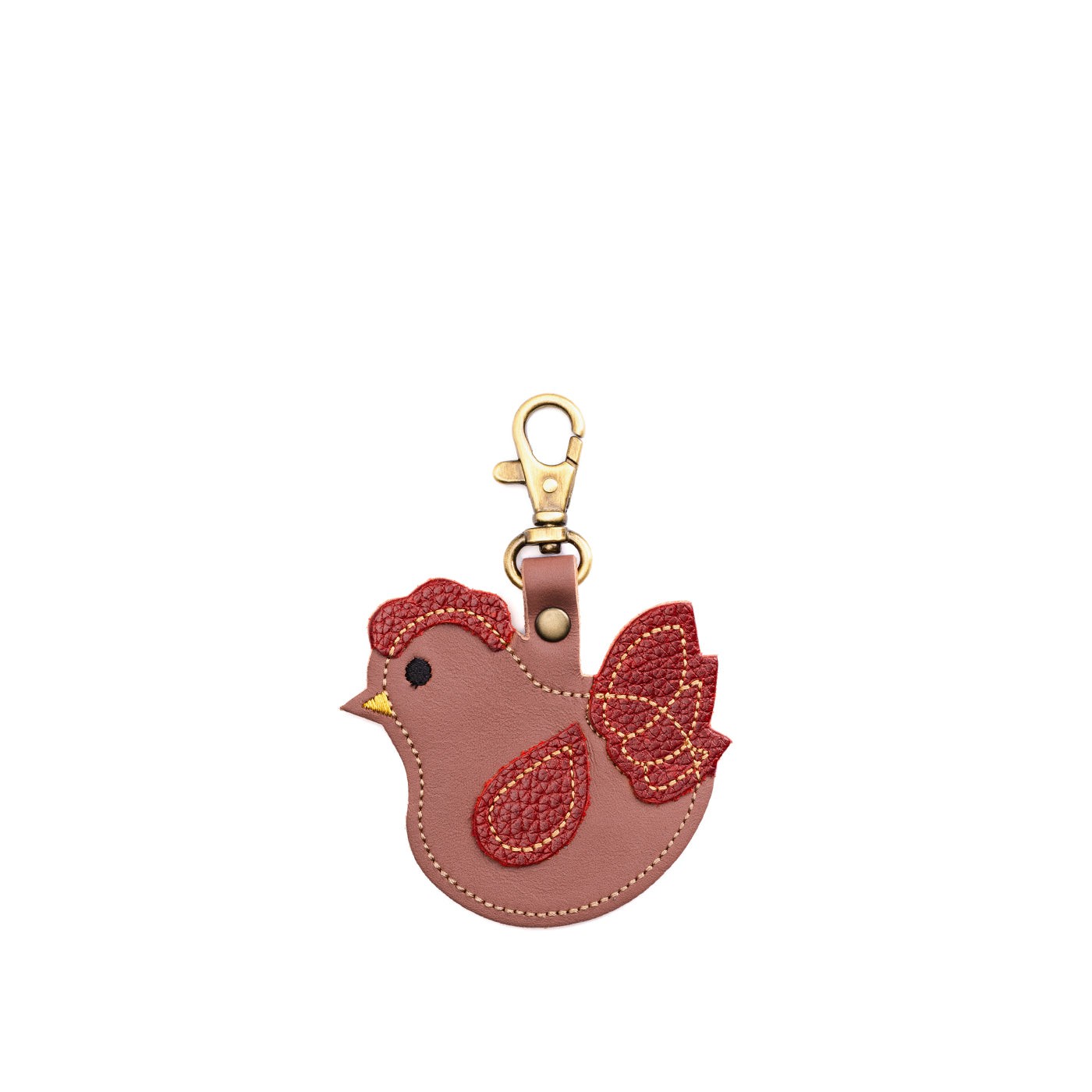 Francesca | Pink chicken-shaped keychain on a white background.