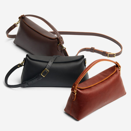 Coldbrew | Leather bowler bag with magnetic closure against a white background