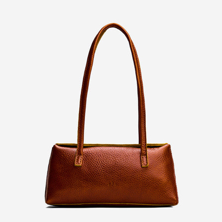 Sienna | Leather bowler bag with magnetic closure