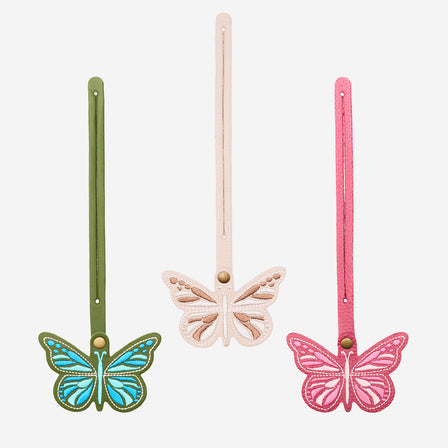 Cactus | Embroidered butterfly tassel accessory on a bag