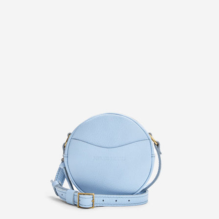 Skyway | Circle shaped crossbody bag with top zipper and gold accents