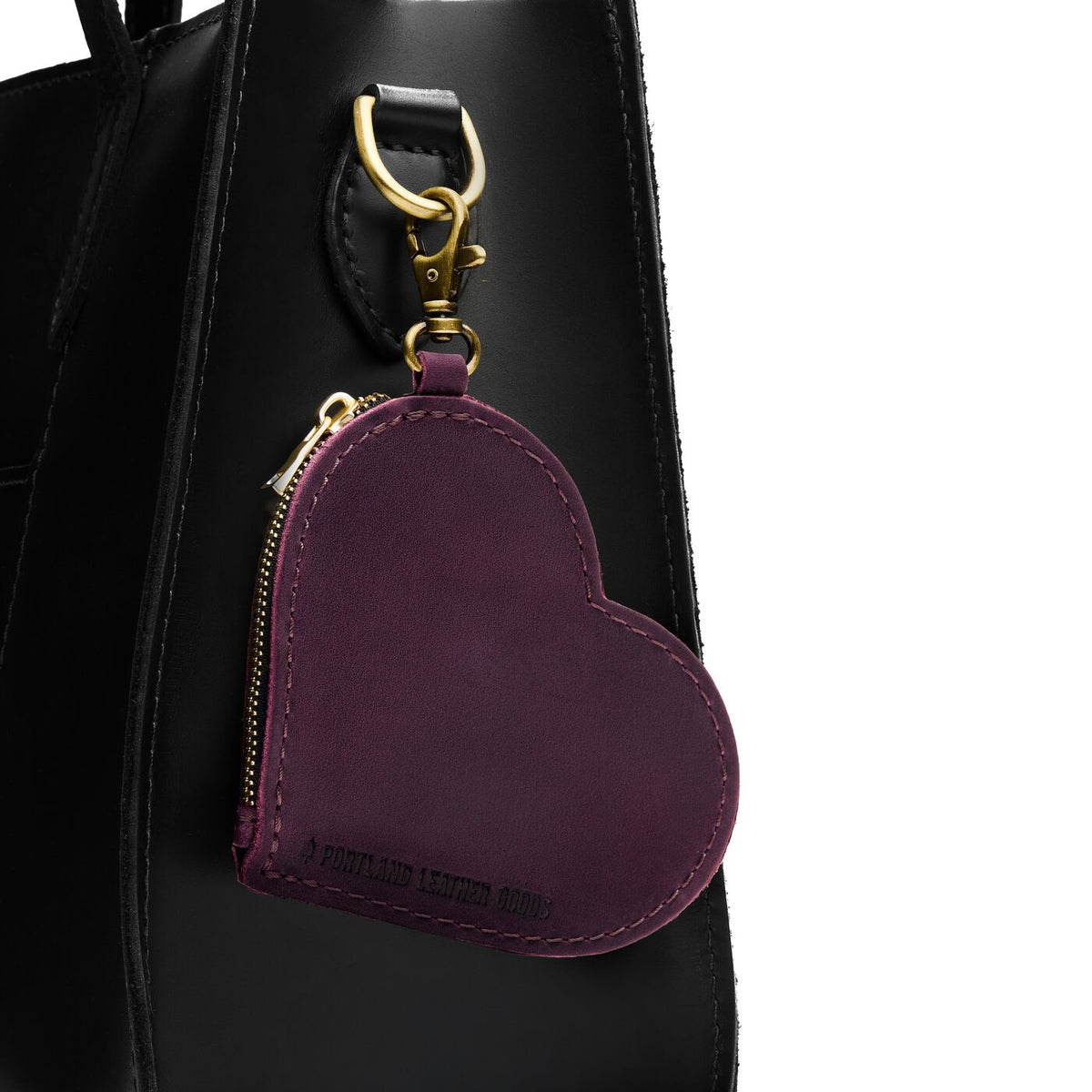 Larkspur | Heart-shaped leather pouch keychain with zipper top and lobster clasp