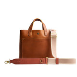 Ivory Cream | Adjustable fabric and leather strap on a leather tote bag