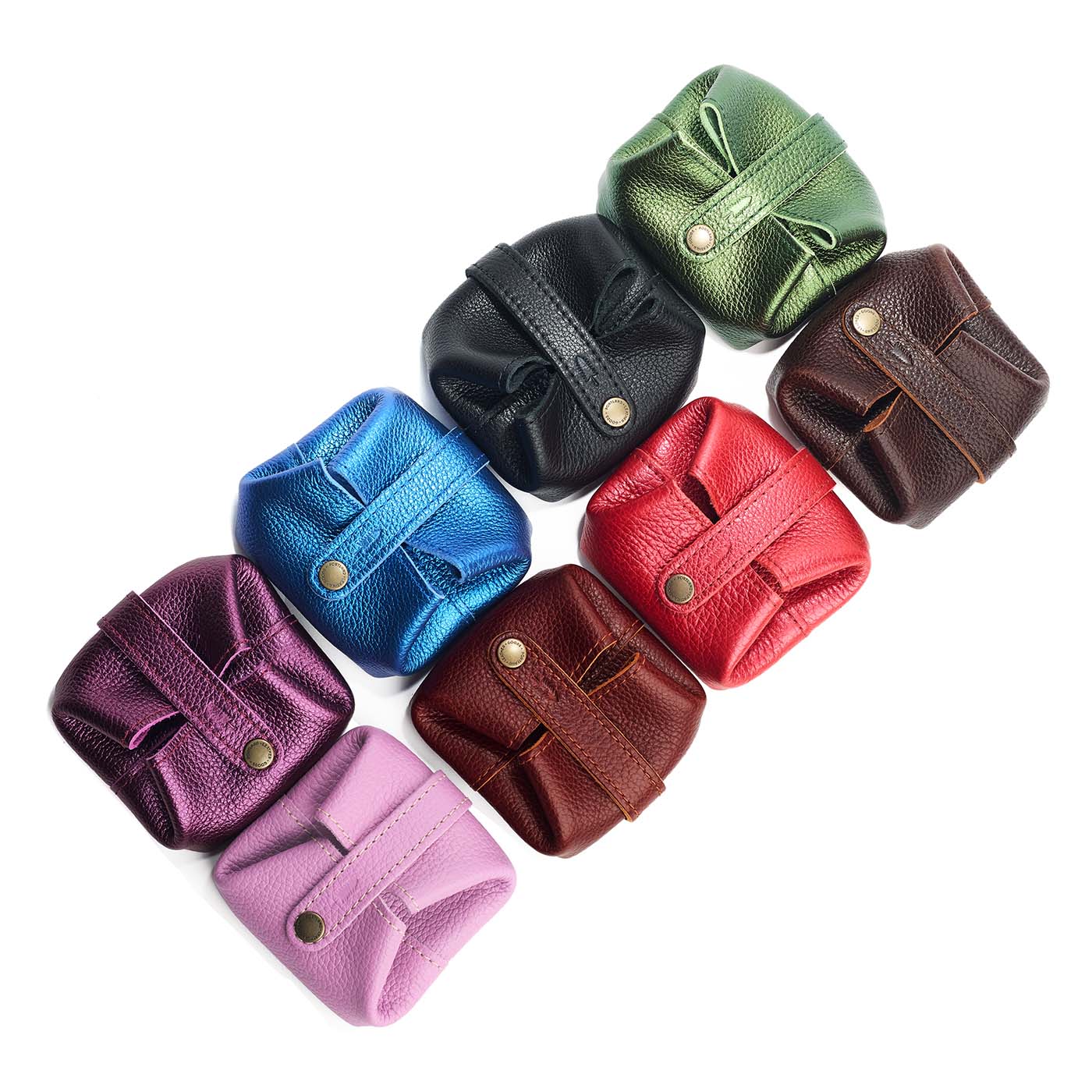 All Variants | Collection of eight foldable square leather pouches with snap closures