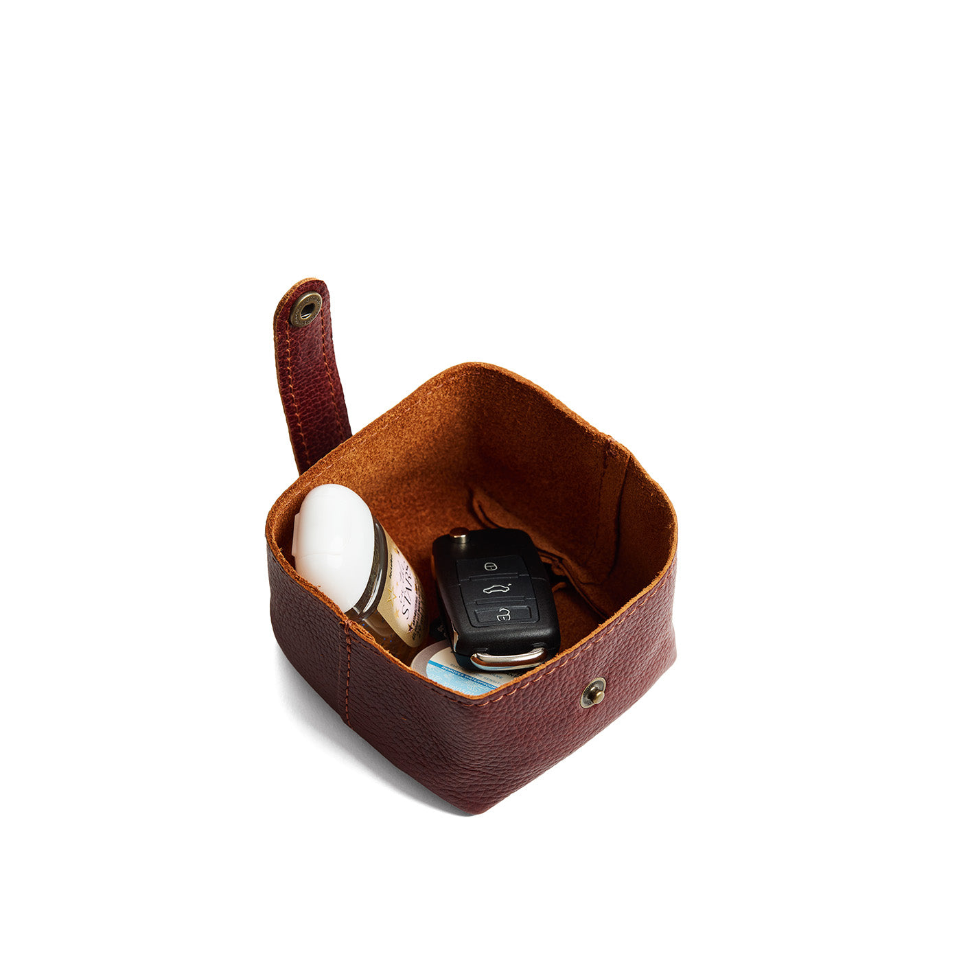 Nutmeg | Foldable square leather pouch with snap closure open