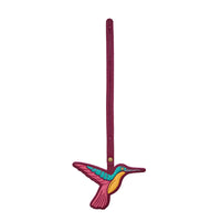 Orchid | Multi-colored hummingbird embroidered on a leather tassel