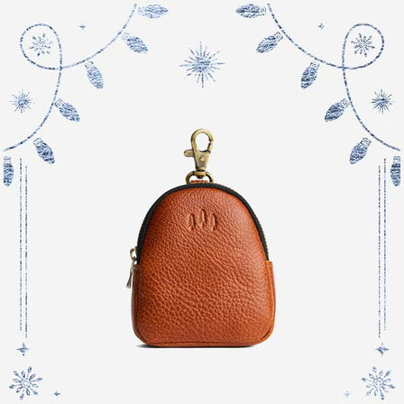 Sienna | Leather keychain pouch with zipper top, swivel lobster clasp, and debossed emblem of three PLG trees