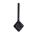 Pebbled--black | Rhombus-shaped leather tag with a strap and debossed PLG design