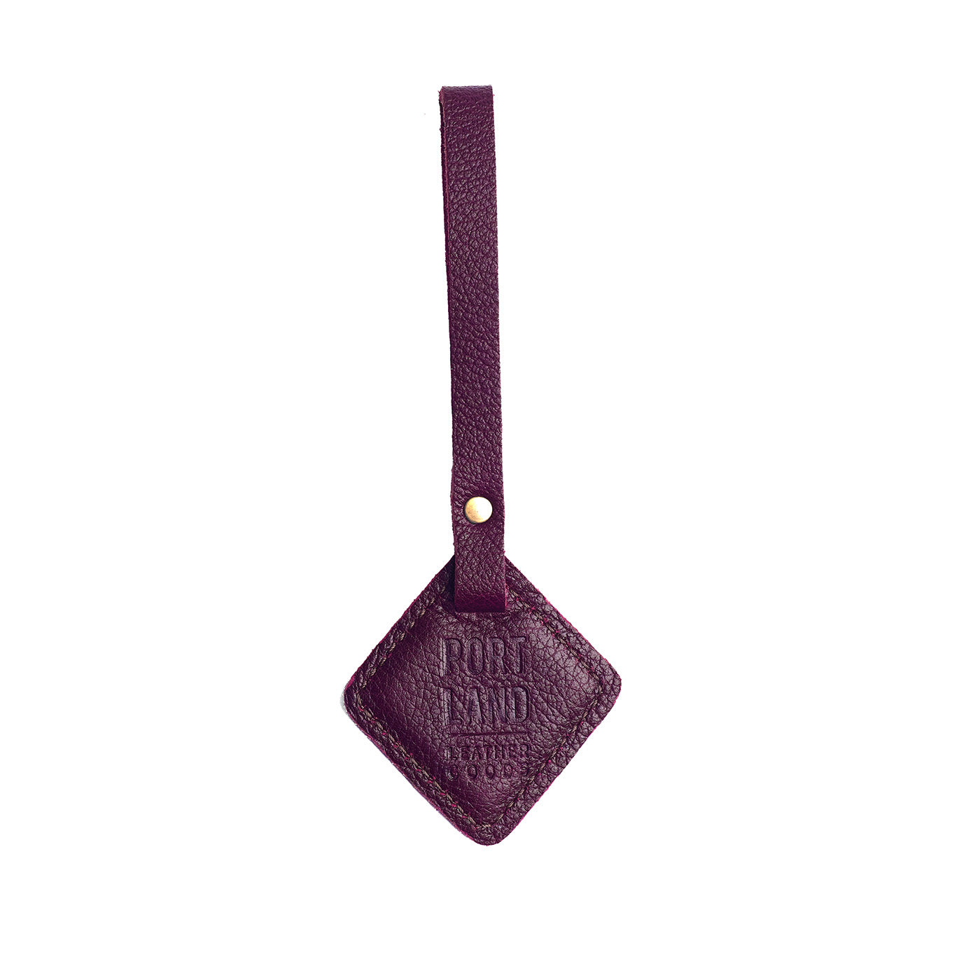 Plum | Rhombus-shaped leather tag with a strap and debossed PLG design