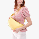 Butter Bliss Large | Model wearing half circle shaped sling bag