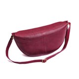 Half circle shaped sling bag