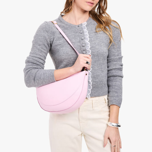 Pinkaboo*Large | Model wearing half circle shaped sling bag