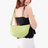 Shadow Lime Large  Model wearing half circle shaped sling bag