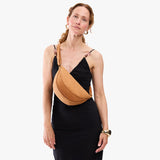 Desert Flower |  Model wearing half circle shaped sling bag