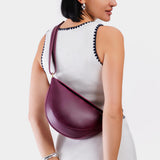 Lollipop Medium | Model wearing half circle shaped sling bag