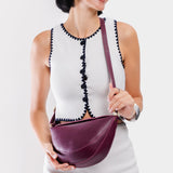 Lollipop Medium | Model wearing half circle shaped sling bag
