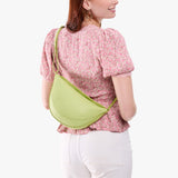 Shadow Lime Medium| Model wearing half circle shaped sling bag