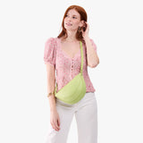Shadow Lime Medium| Model wearing half circle shaped sling bag