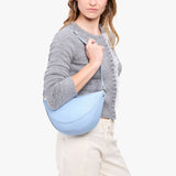 Skyway Medium | Model wearing half circle shaped sling bag
