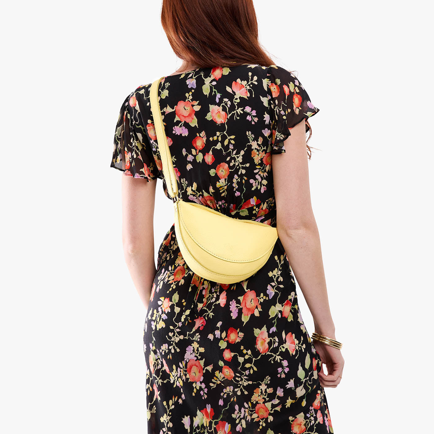 Butter Bliss*Small | Model wearing half circle shaped sling bag