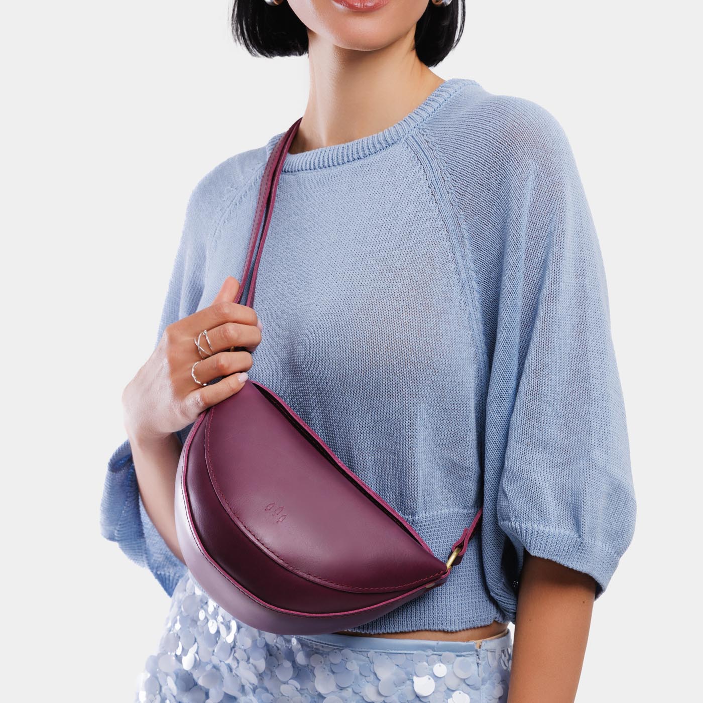 Lollipop*Small | Model wearing petite half circle shaped sling bag