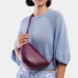 Lollipop Small | Model wearing petite half circle shaped sling bag