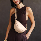 Moonflower Small | Model wearing petite half circle shaped sling bag