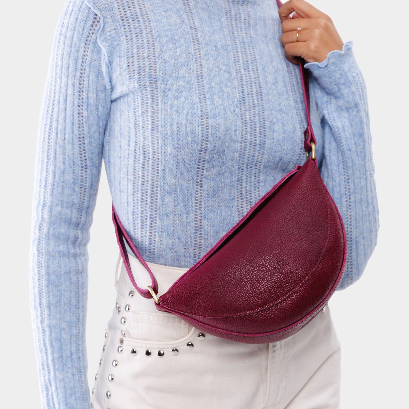 Orchid*Small | Model wearing half circle shaped sling bag