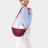 Orchid Small | Model wearing half circle shaped sling bag