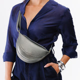 Stardust Small | Model wearing half circle shaped sling bag