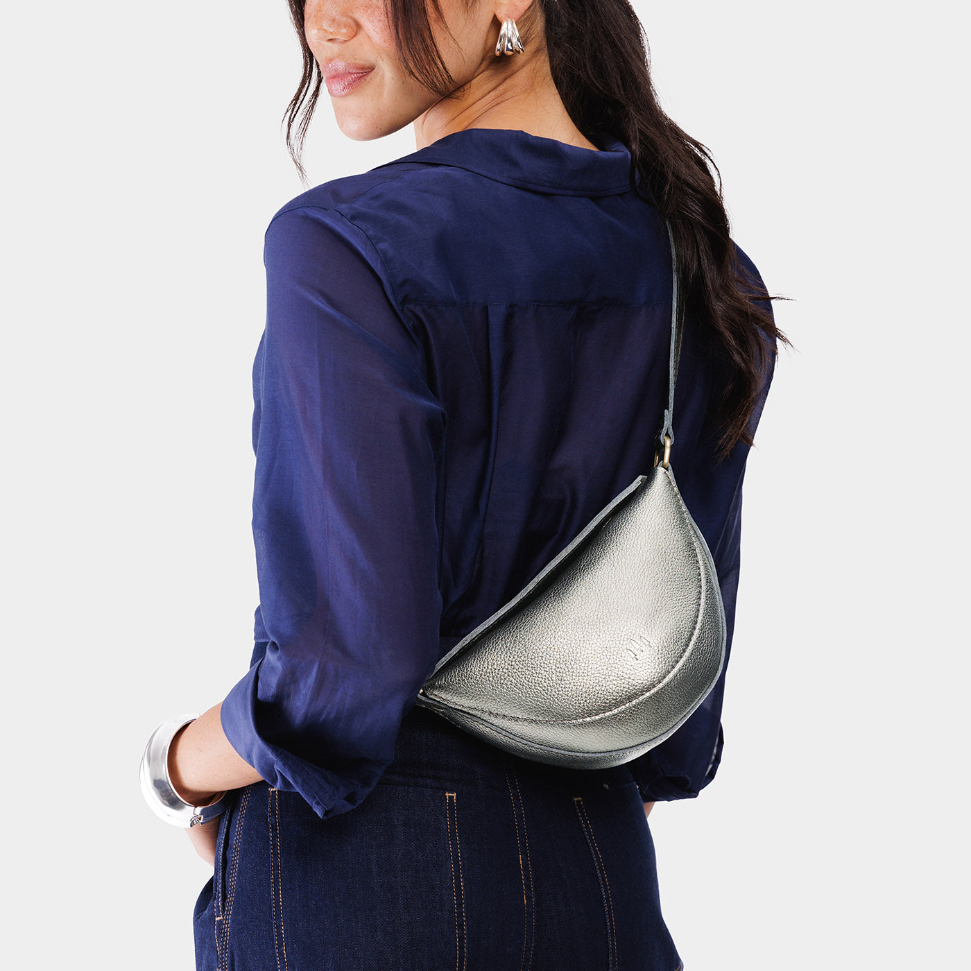Stardust*Small | Model wearing half circle shaped sling bag