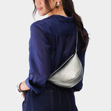 Stardust Small | Model wearing half circle shaped sling bag