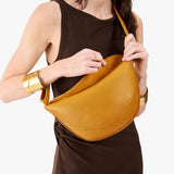 Sunshine Medium | Model wear half circle shaped sling bag
