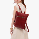 Chili Red | Model wearing rectangular slim leather laptop backpack