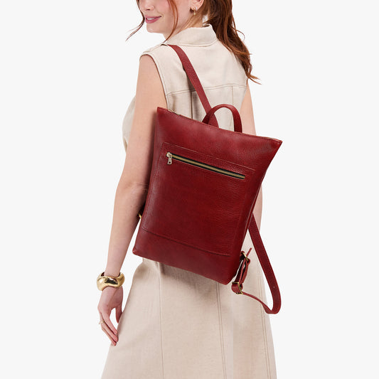 Chili Red | Model wearing rectangular slim leather laptop backpack