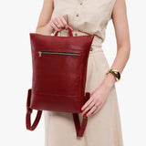Chili Red | Model wearing rectangular slim leather laptop backpack