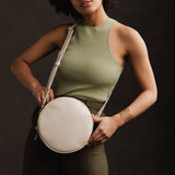 Bone Large | Circle shaped crossbody bag with top zipper
