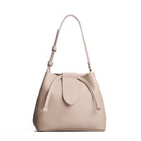 Oatmilk*Large | Symmetrical leather bag with leather drawstring closure and adjustable shoulder strap