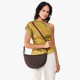 Moose Large | Model wearing petite half circle shaped sling bag