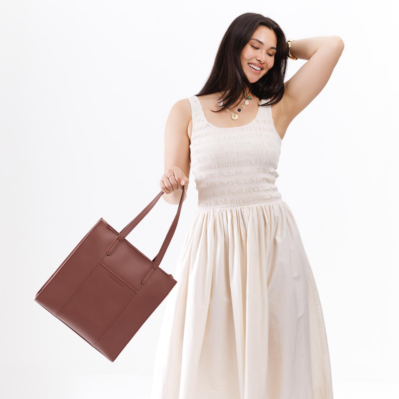 Sunkissed*North/South | Structured large tote bag with overlapping panels and crossbody strap