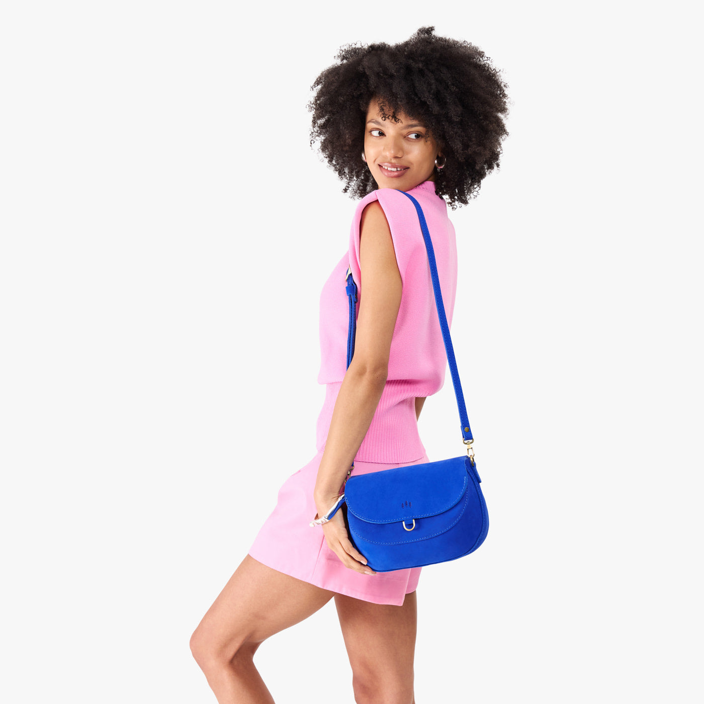 Blue Joy*Large | Model wearing a leather Crossbody with a flap and magnetic closure